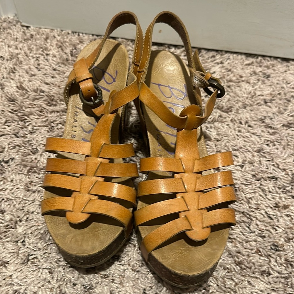 Blowfish wedge sandals are a popular choice for all-day wear.
